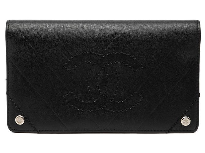 Cartera larga bifold Chanel V-Stitch Coco Mark en negro