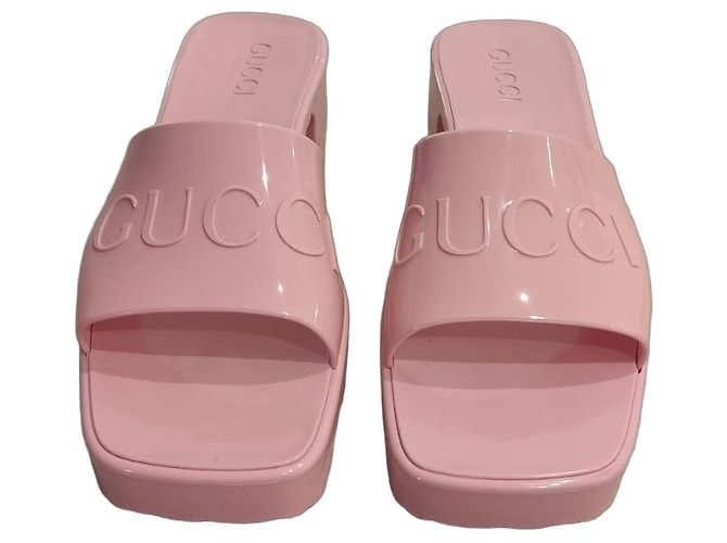 Gucci Pink Rubber Clogs.