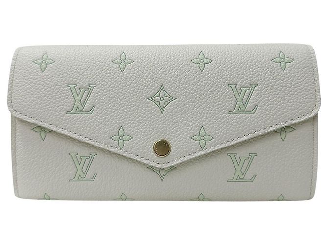 Sarah Cartera Larga Monogram Empreinte Louis Vuitton Blanco