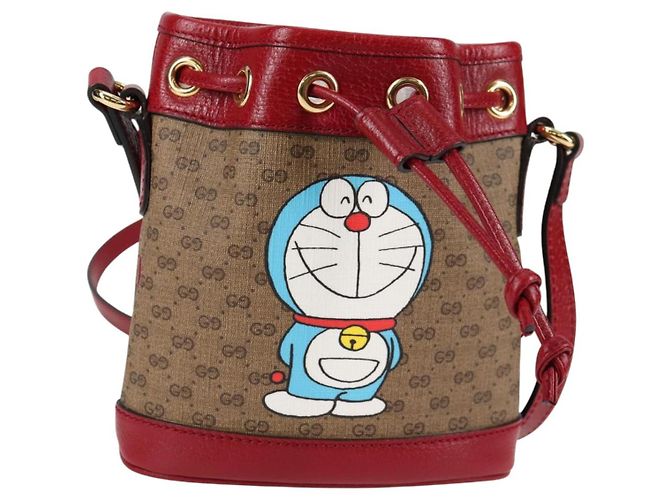 Bolsa de colaboração GUCCI Micro GG Supreme Doraemon em PVC bege 647801 Auth 138992SAM