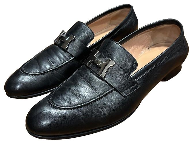 Mocasines de cuero negro Hermès con hebilla 'H'