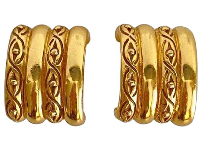 Boucles d'oreilles clip Yves Saint Laurent dorées 
