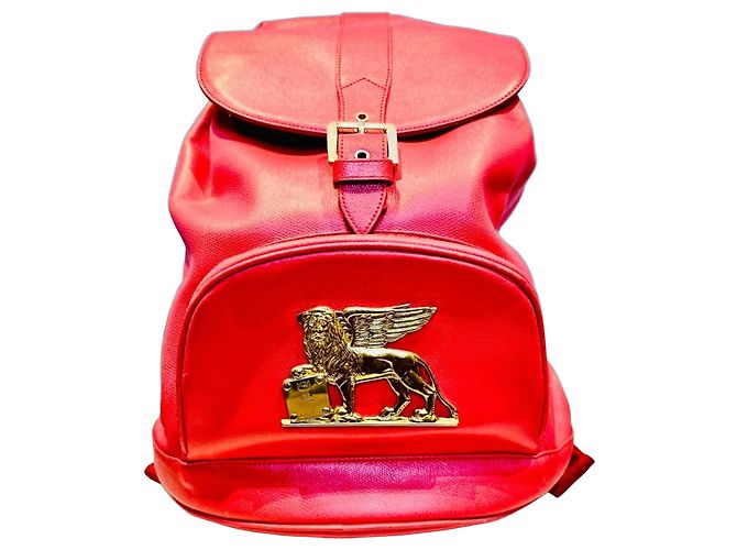 Red MCM Backpack with Lion Appliqué