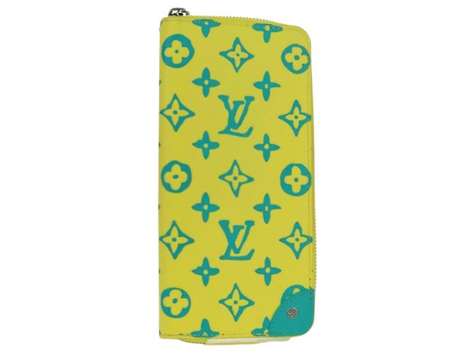 Cartera Vertical Zippy Playground LOUIS VUITTON Amarilla M82005 Auth 171843M Amarillo