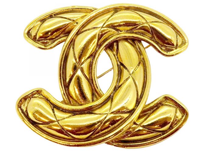 Timeless Spilla Matelassé Coco Mark di Chanel D'oro