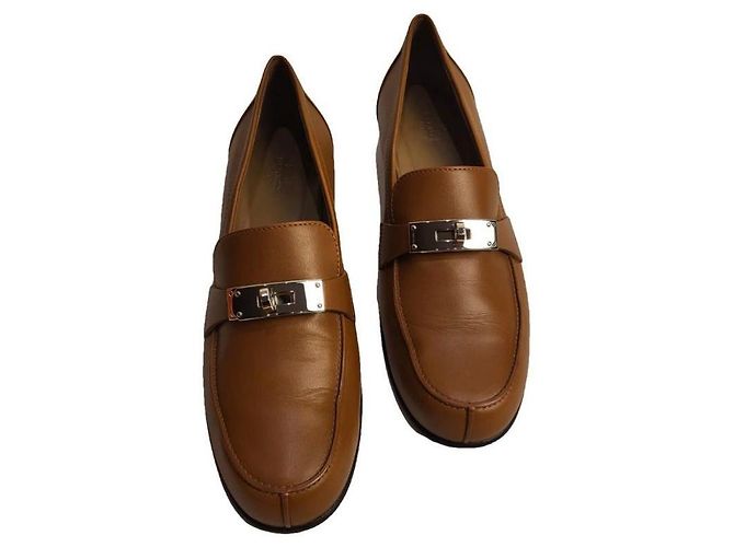 Braune Lederloafers von Hermès mit silberner Hardware