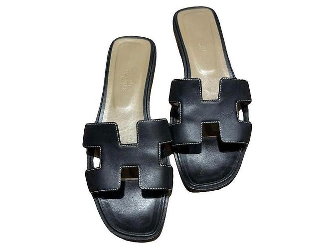 Sandali Oran Hermès in pelle nera Nero