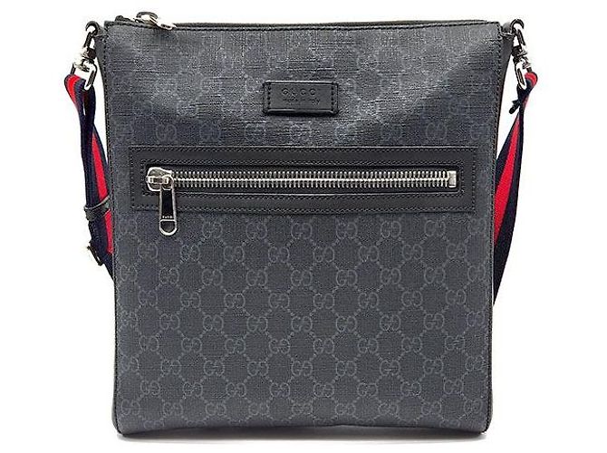 Gucci Bolsa transversal GG Supreme Marrom