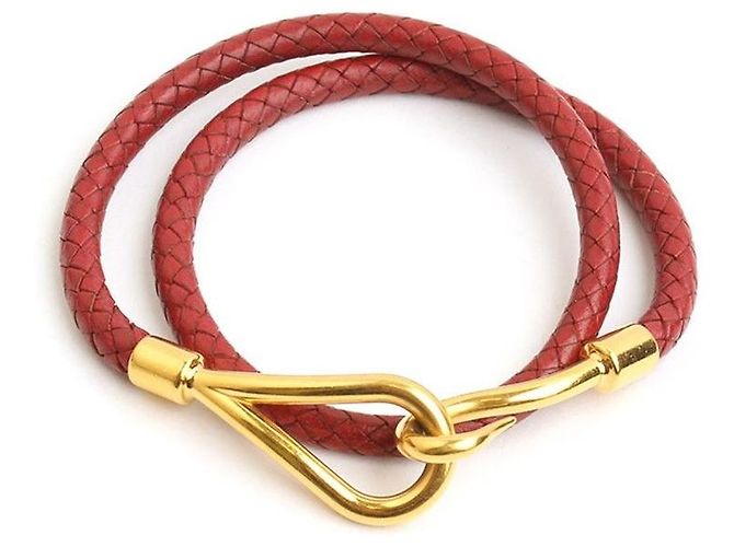 Hermès Colar e pulseira de couro trançado bordô com tom dourado Vermelho