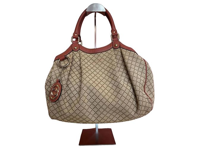 Bolsa Gucci Sukey em lona GG e couro bege coral Rosa
