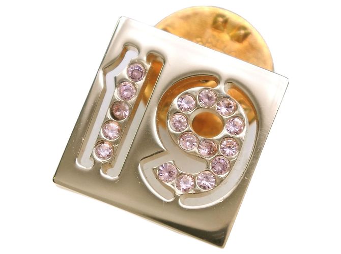 Spilla a spillo Chanel placcata in oro con strass No 19