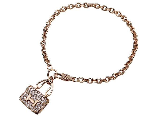 Constance Pulsera charm de oro rosa Hermès Dorado