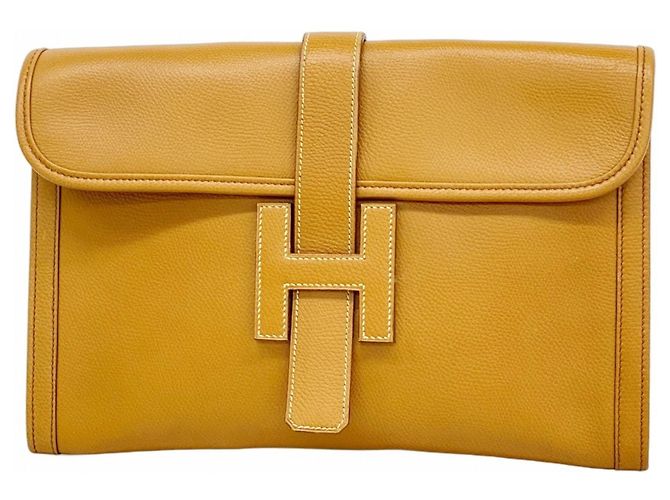 Bolso Clutch Jige PM de Hermès en Cuero Ardennes Dorado