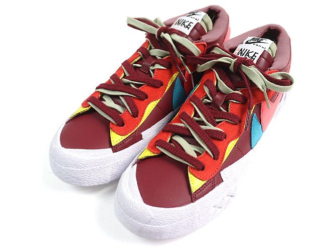 Nike KAWS Sacai Blazer Low Leder Sneakers Rot