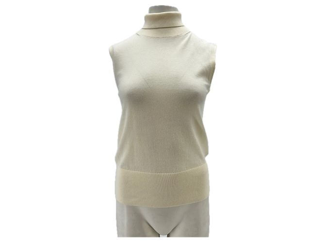 Autre Marque Jersey de cuello alto beige sin mangas de lana