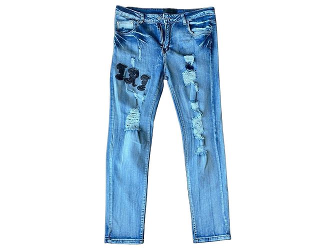 Amiri Blue Denim Jeans with Patch