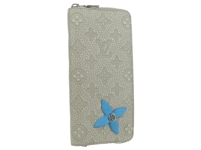 LOUIS VUITTON Taurillon Climbing Zippy Wallet Vertical Ivory M81573 Auth 172432SAM Cream
