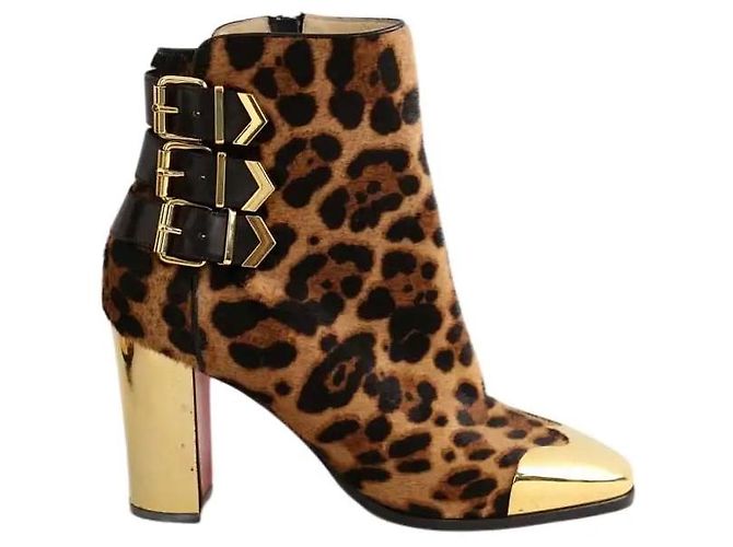Christian Louboutin Botas de couro marrom com fivelas