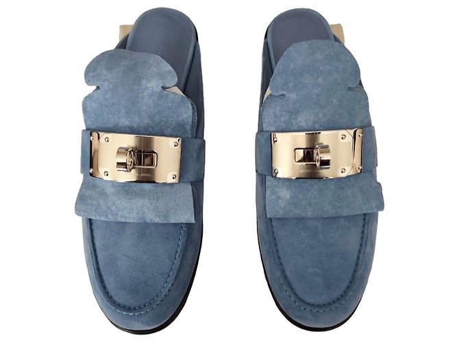 Sky blue suede mules by Hermès