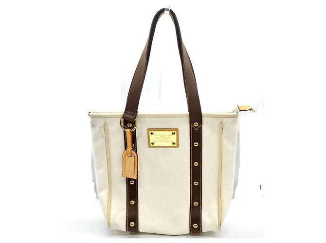 Sac cabas MM Antigua de Louis Vuitton Marron Blanc Écru