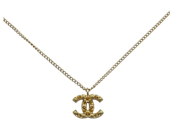 Collar de Hombre Chanel con la Marca Coco Beige Dorado