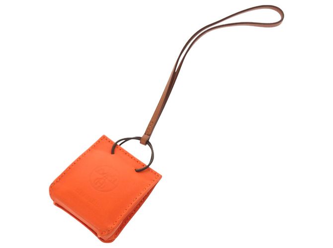 Charm de bolso de cordero Milo naranja de Hermès