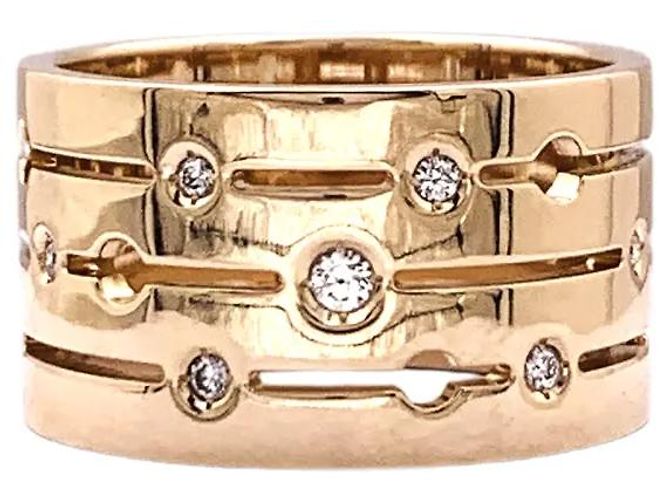 Anello Dinh Van, 'Pulse', oro rosa e diamanti.