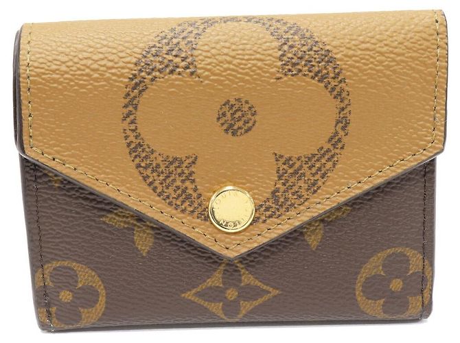 Cartera Trifold Monogram Zoe Louis Vuitton Castaño