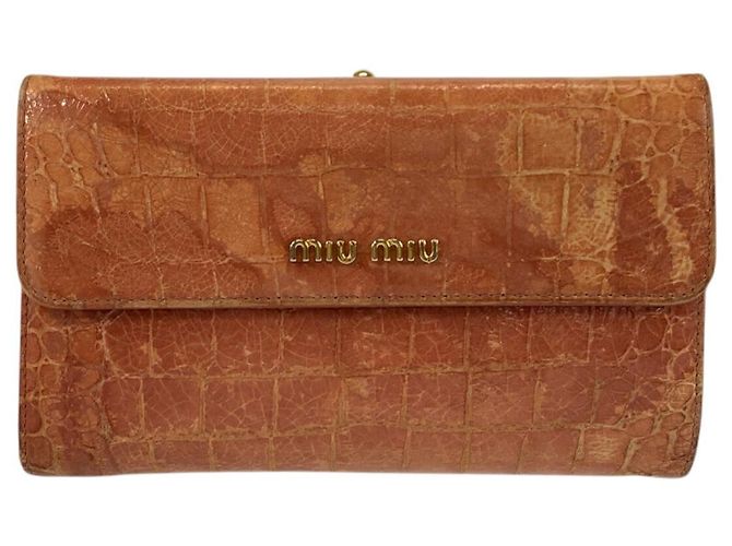 Billetera compacta de cuero grabado Miu Miu Rosa