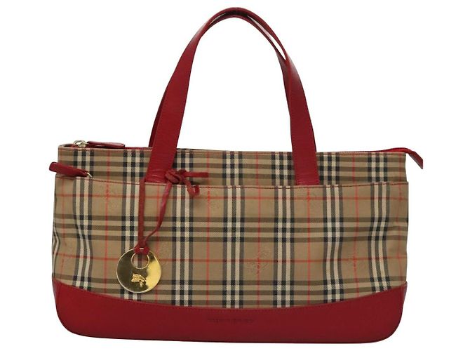 Burberry Nova Check
Lona Nova Check y cuero Beige