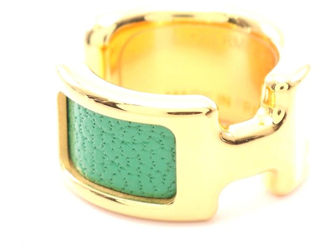 Hermès Pendientes de cuero chapados en oro Hermes Oran PM Dorado Metálico