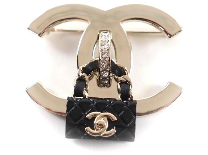 Broche COCO Mark de Chanel Doré Métallisé