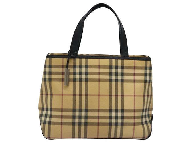Burberry Nova Check
Lona Nova Check e couro Bege