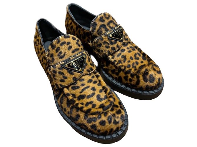 Mocasines de pelo de ternera con estampado de leopardo Prada