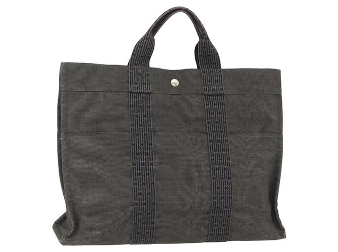 Bolso Hermès Her Line MM Gris