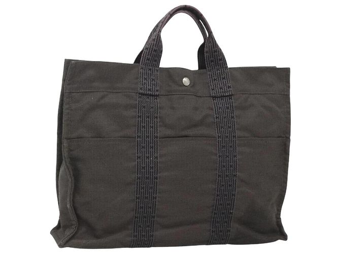 Bolso Hermès Her Line MM Gris