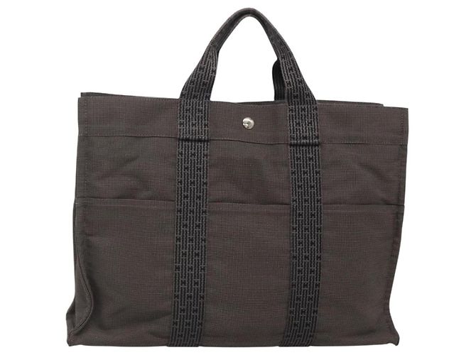 Bolso Hermès Her Line MM Gris