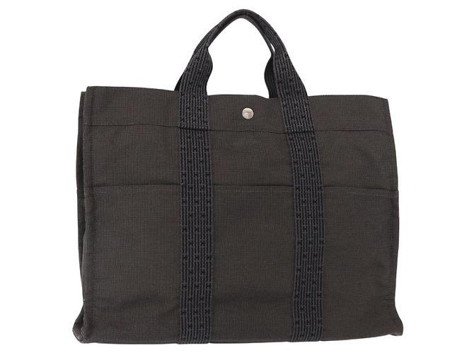 Bolso Hermès Her Line MM Gris