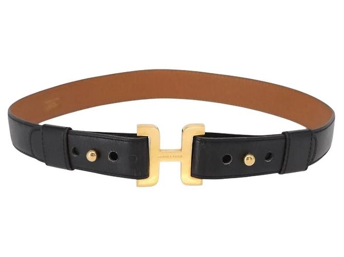 Cinturón H de cuero negro y dorado de Hermès