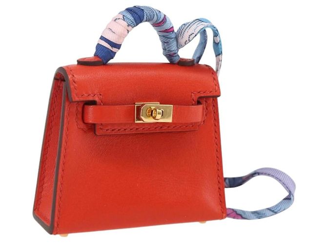 Charm de bolsa Twilly Micro Kelly da Hermès Laranja 
