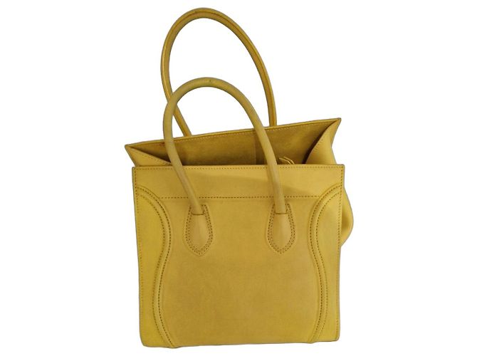 Céline Phantom em couro amarelo. Item usado em perfeito estado
