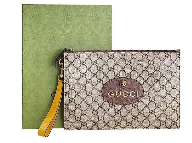 Gucci Clutch GG Marrone