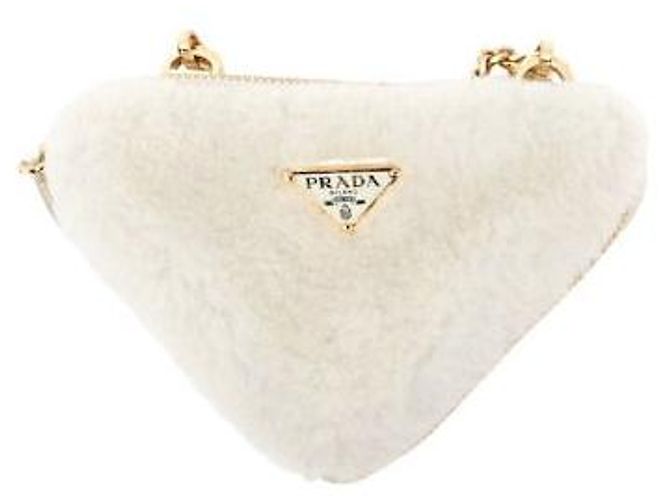 Prada Bolso cruzado triangular de shearling blanco