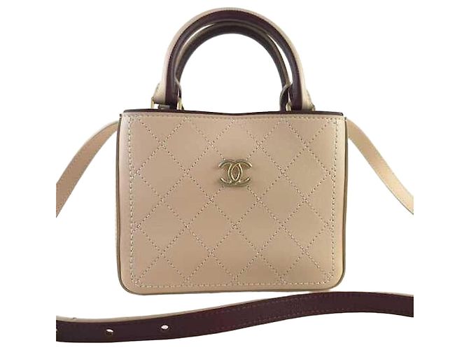 Chanel Bolsa de ombro com alça superior e crossbody Laranja
