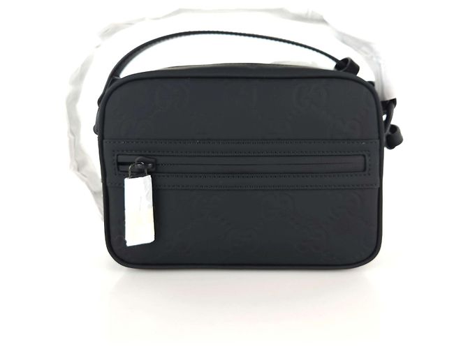 Gucci Bolsa transversal de couro com efeito borracha GG Preto