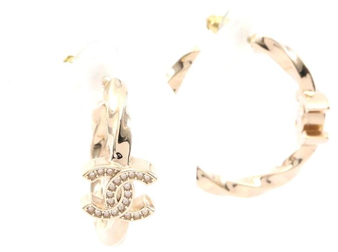 Boucles d'oreilles créoles Chanel Coco Mark en or avec strass Doré Métallisé
