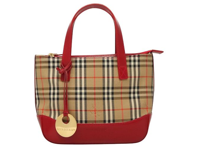 Burberry Nova Check
Tela Nova Check e pelle Beige