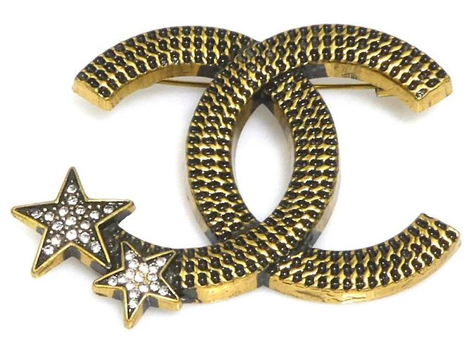 Spilla in oro e argento Chanel D'oro 
