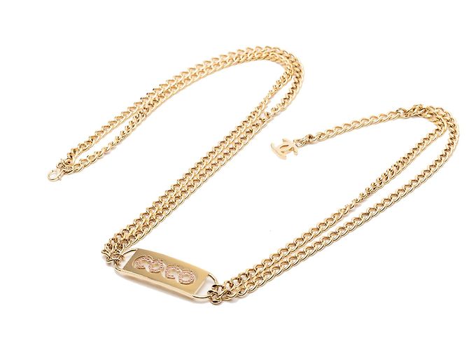 Cinturón de doble cadena Coco de strass chapado en oro de Chanel