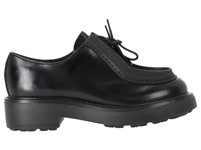 Prada Diapason Slipper aus schwarzem Leder